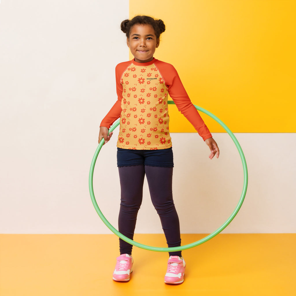 SUCCESS WIRE Power Flower Chardonnay Orange Rash Guard for Little Girls (2T-7)