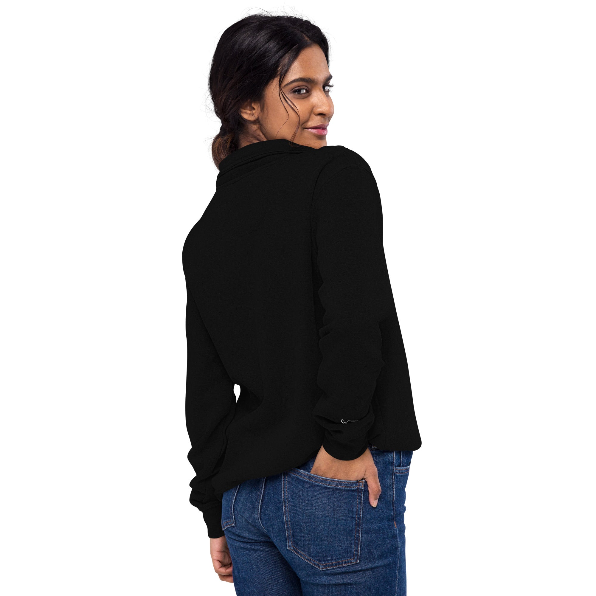 Woman wearing a SUCCESS WIRE black quarter zip pullover and blue jeans on a white background