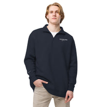 Load image into Gallery viewer, Man wearing a navy blue quarter zip pullover with SUCCESS WIRE logo on a white background
