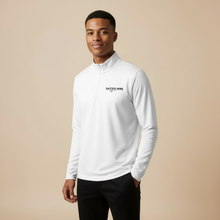 Load image into Gallery viewer, Man wearing a SUCCESS WIRE quarter zip pullover with SUCCESS WIRE logo on a beige background
